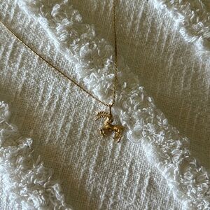 Vintage 70s Monet gold tone goat necklace